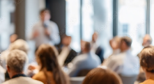 Audience seated at a business presentation
